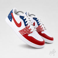 Angled view of the custom Stateside Drive Jordan 1 Low Golf featuring distressed American flag graphics, red hand painted panels and blue star heel details