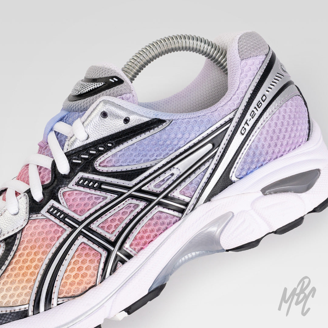 Custom Asics GT-2160 Sunset Dip Dye trainer with pink purple gradient and silver overlays
