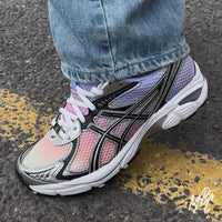 On-foot custom Asics GT-2160 Sunset Dip Dye sneaker with pink and purple sunset gradient finish