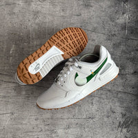 Custom Nike Pegasus 89 Golf sneaker customised with green swoosh and golfer hitting ball illusion
