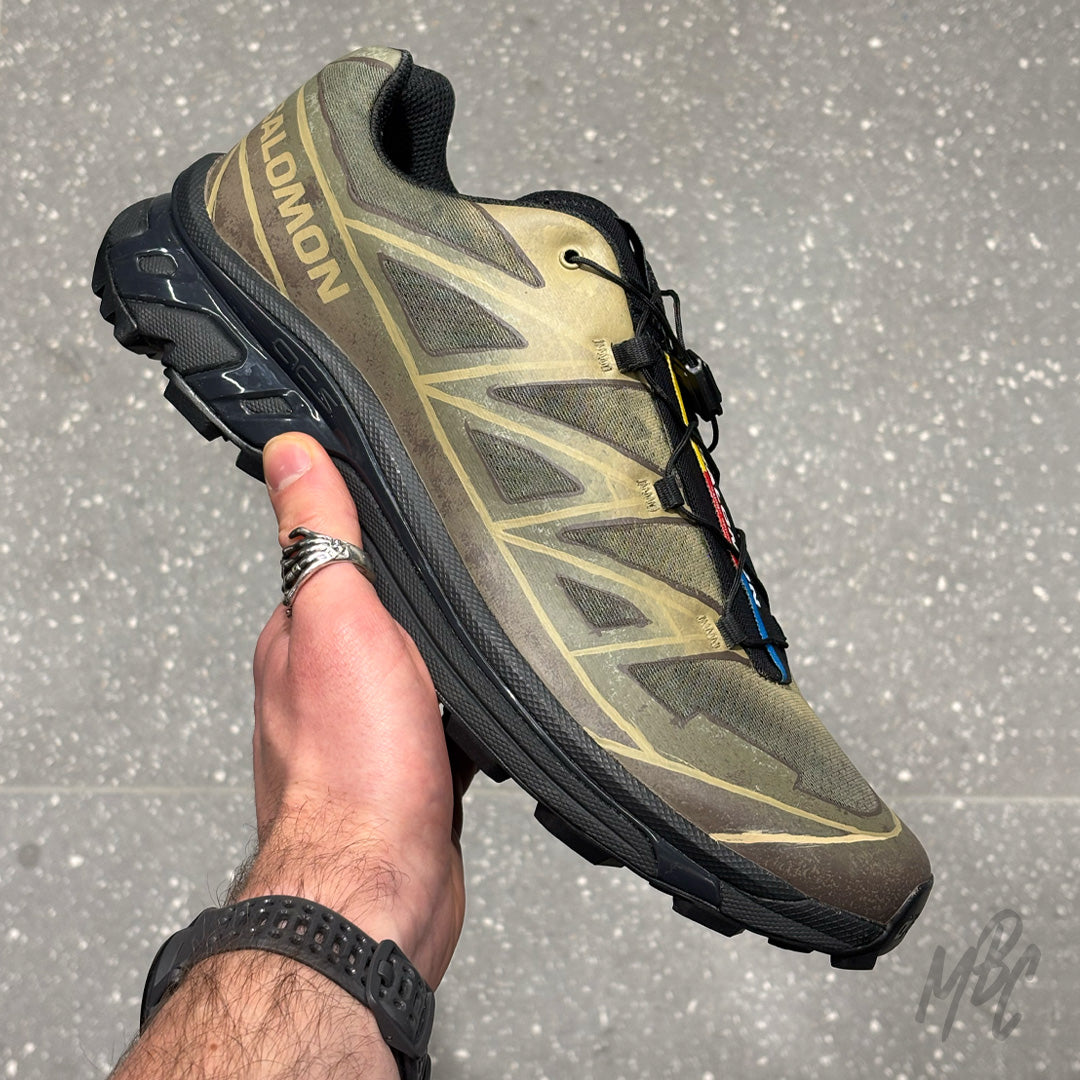 Close up Terrain Roamer Salomon XT-6 custom with natural landscape inspired finish