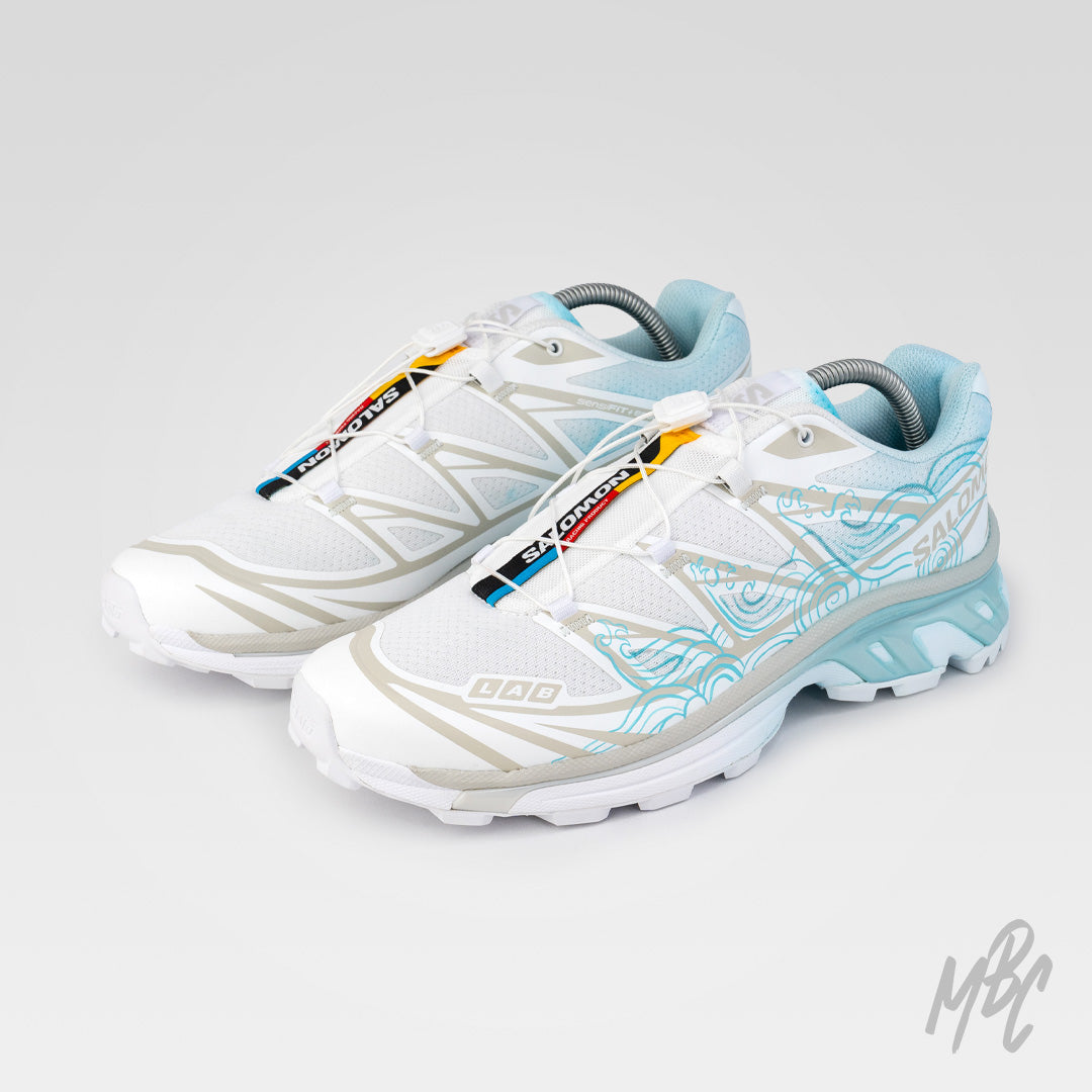 Waveform Salomon XT-6 pair with blue dip dyed heel and hand painted wave design
