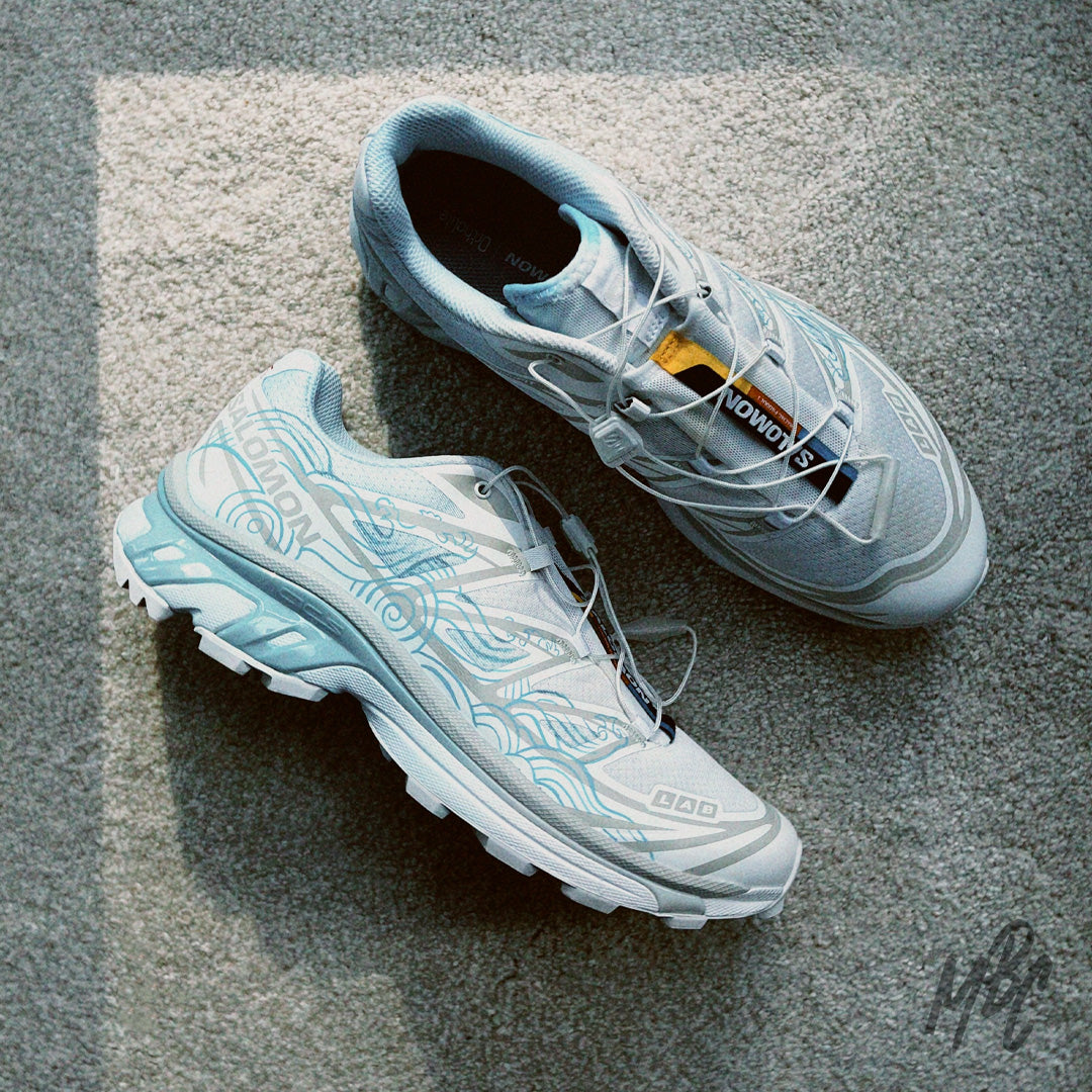 Custom Salomon XT-6 Waveform trainers in white with blue waveform design, technical trail running sneaker