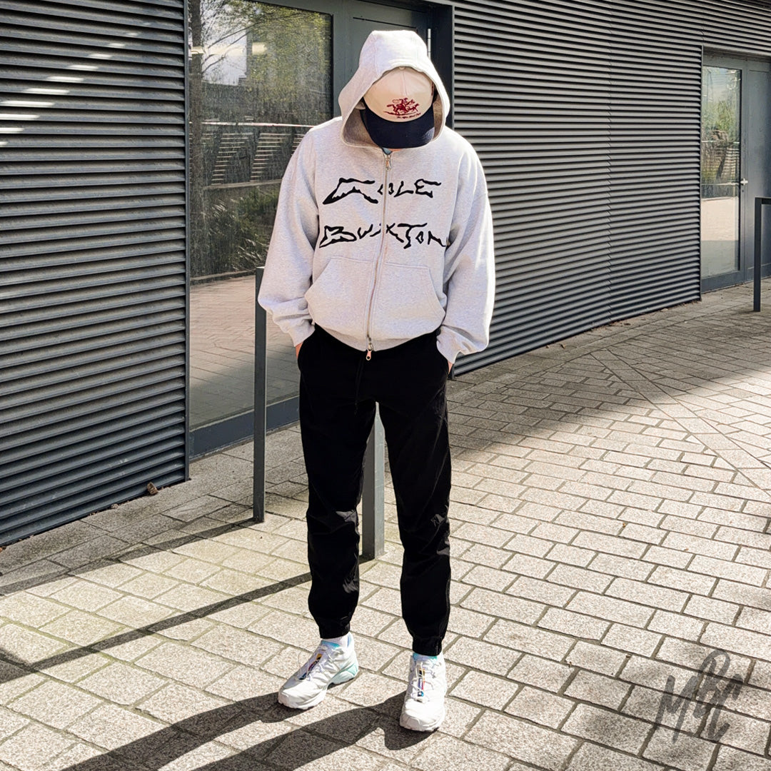 Custom Salomon XT-6 Waveform trainers styled on foot with streetwear outfit, white and blue colourway