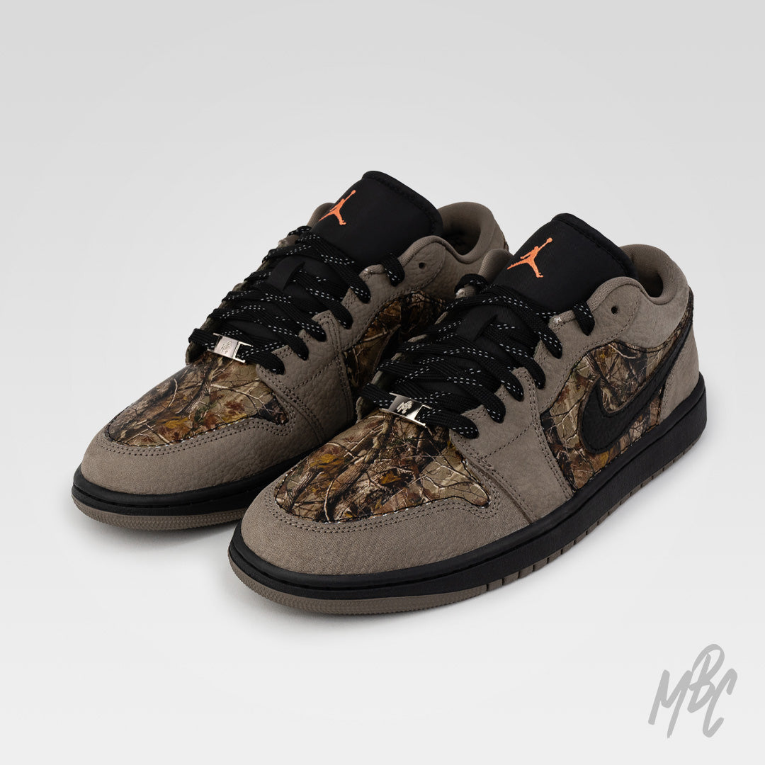 Woodland Camo Jordan 1 Low custom pair angled view with black swoosh and camo panels