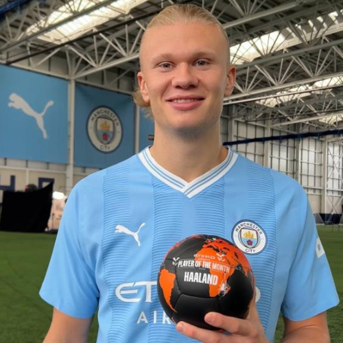 Custom award gifting football by MattB Customs for Manchester City Player of the Month campaign. Haaland holding his custom Manchester City player of the month football.