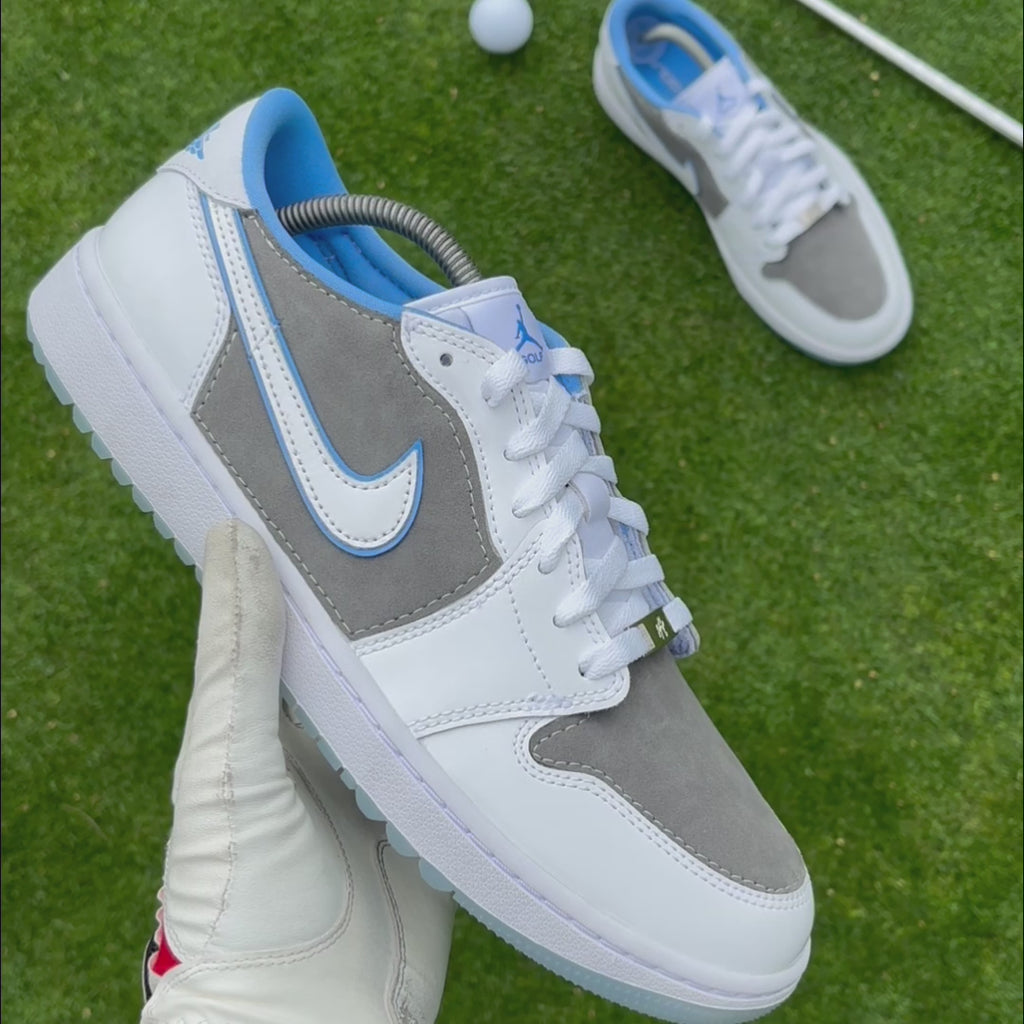 Slate Suede custom Jordan 1 Low Golf shoes featuring premium grey suede and white leather showcased on a golf course.