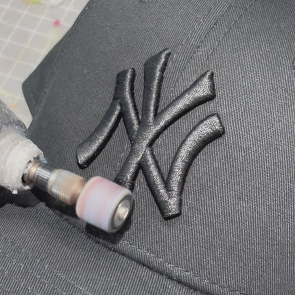 Video of hand customised New Era cap UK featuring raw edge distressing, frayed brim detailing and custom finish